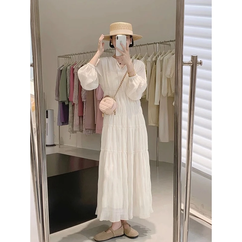 D056法式白色长袖连衣裙女2023新款夏季海边度假沙滩垂坠质感长裙