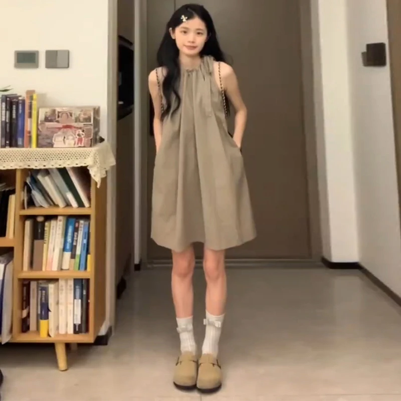 C451度假风挂脖连衣裙子女装夏季双十一新款高级设计感小个子短裙