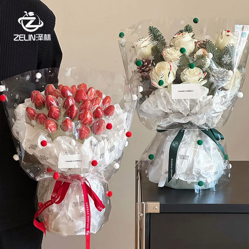 圣诞节新款花艺毛球雪花玻璃纸透明加厚OPP膜草莓网红花束包装纸