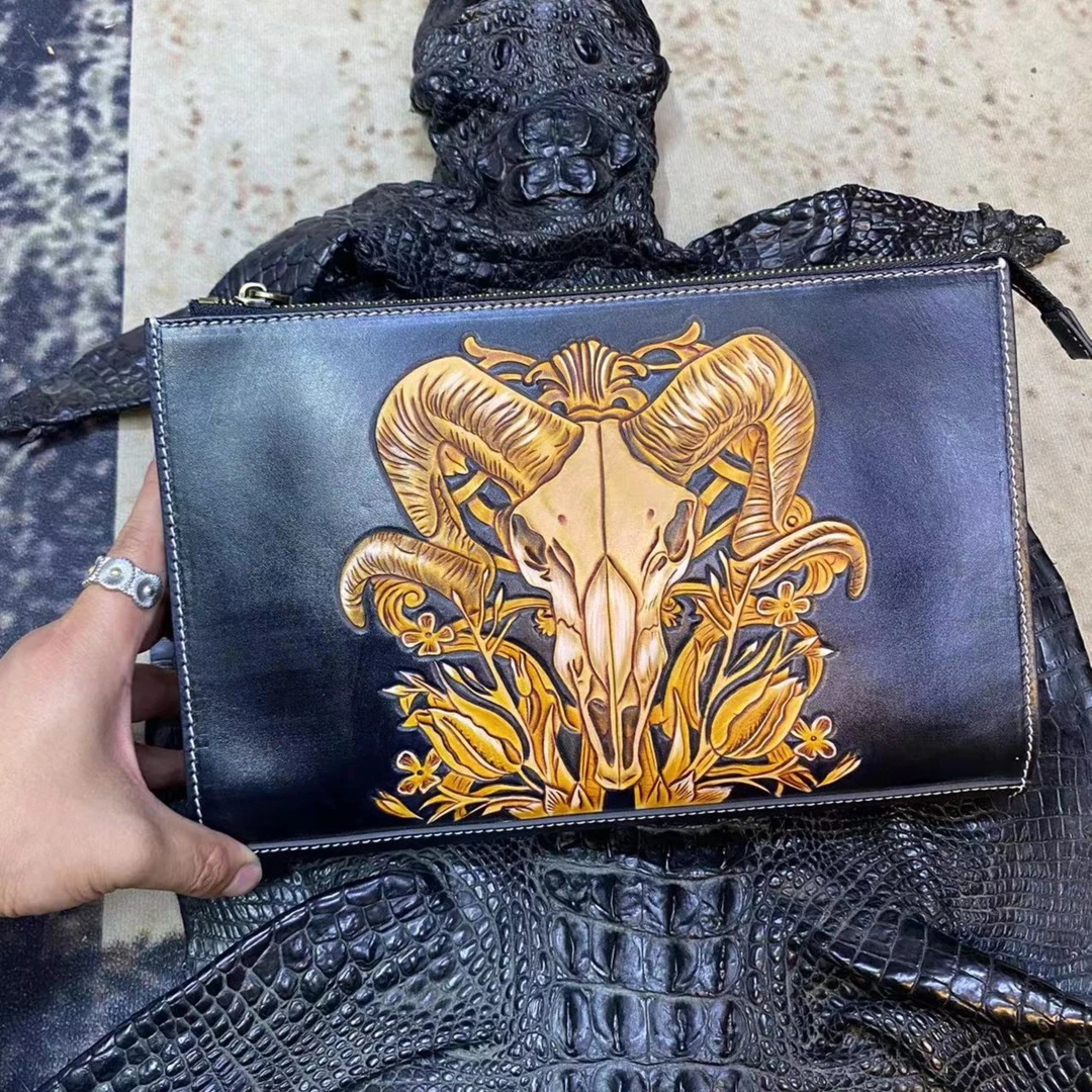 扬名立万复古皮雕手包(尺寸长29高19）7788-123456