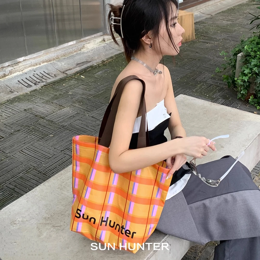 SUN HUNTER/三横 首饰袋 原创橘子汽水编织袋联名手提袋挎包通勤