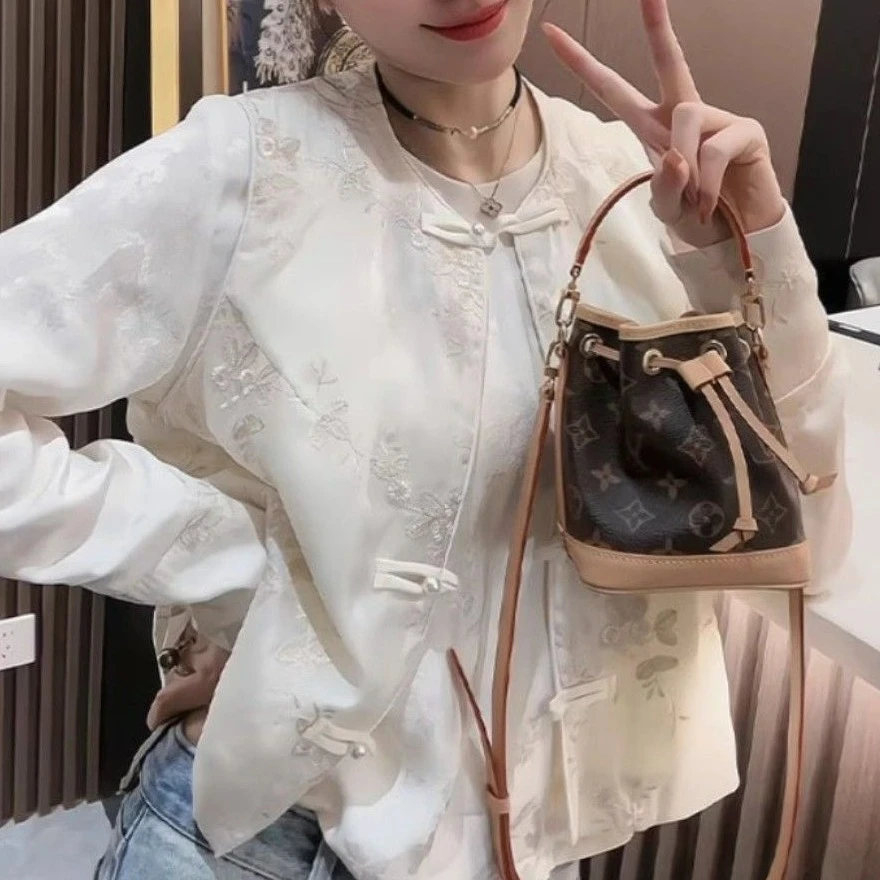 新中式盘扣马甲t恤两件套女秋装2025新款气质减龄重工轻国风上衣