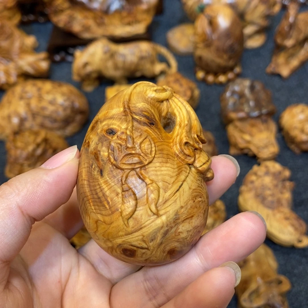 柏木(崖柏)骑**穷精品陈化瘤疤钱袋手摆件
