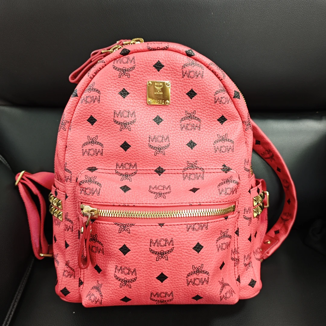 95新 MCM 玫红色小号涂层帆布印花双肩包