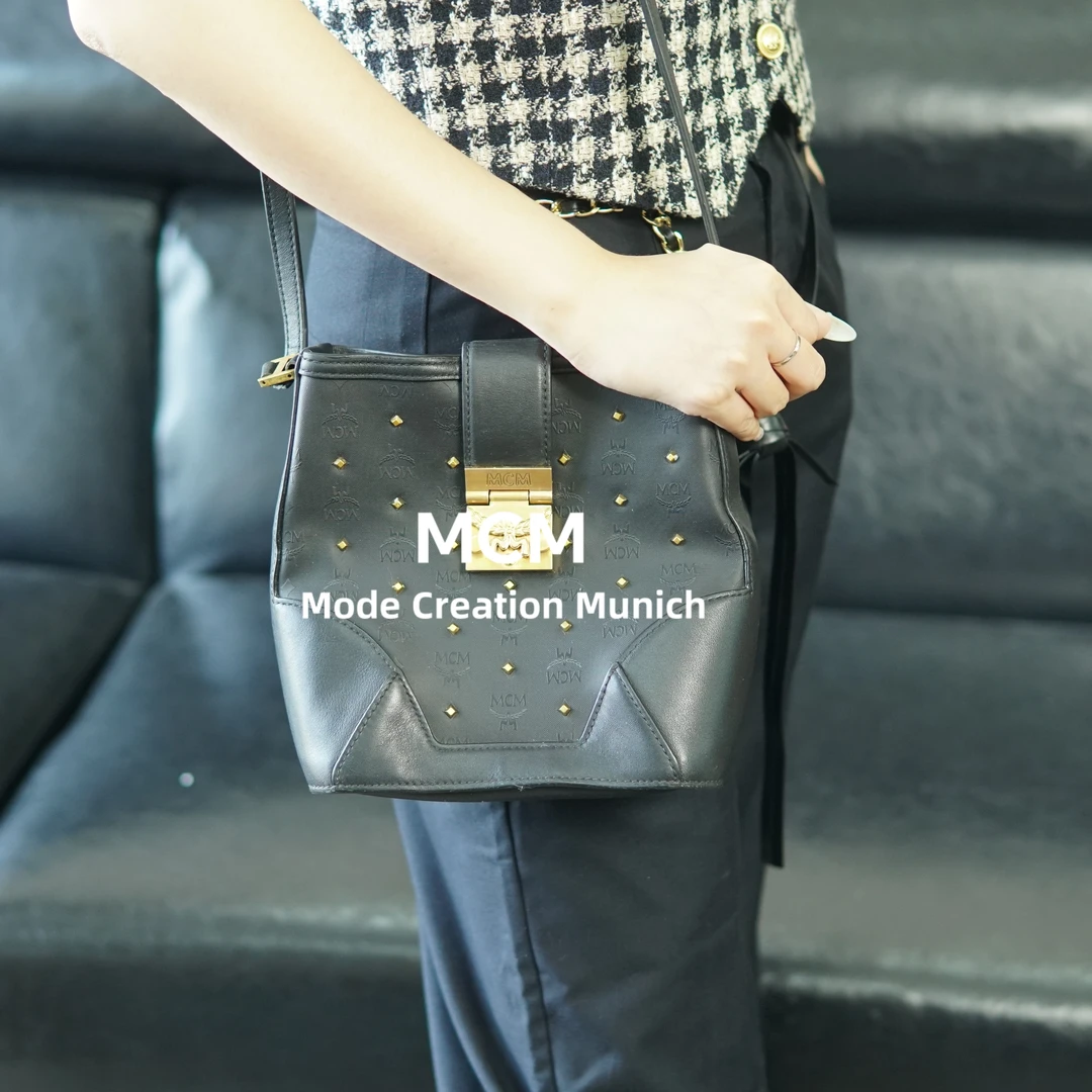 95新 MCM 黑金单肩包/bb07317010/7010