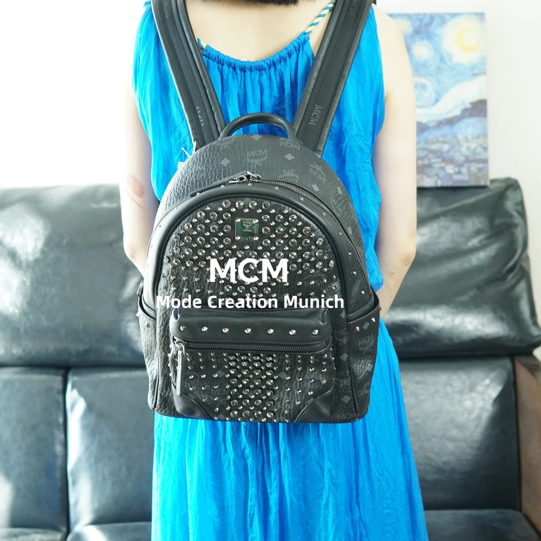 95新 MCM 黑色铆钉双肩包/HJ08523013/3013