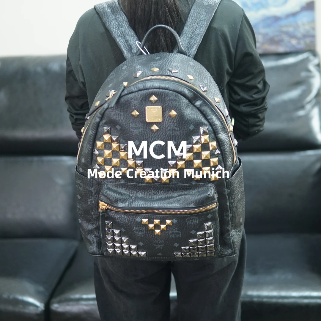 95新 MCM 黑金双肩包/ZZ09613098/3098