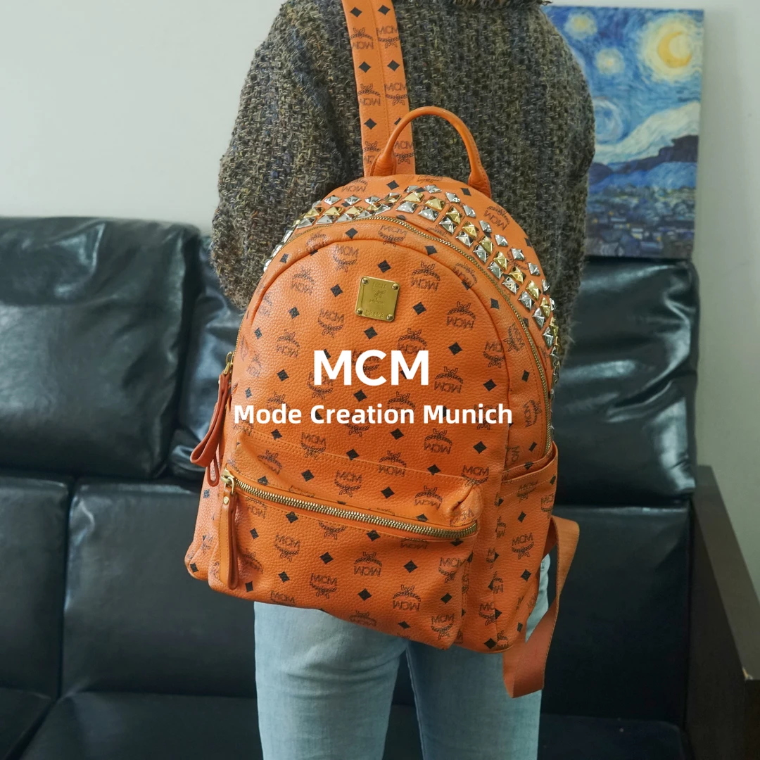 95新 MCM 橙色双肩包/CY10728357/8357