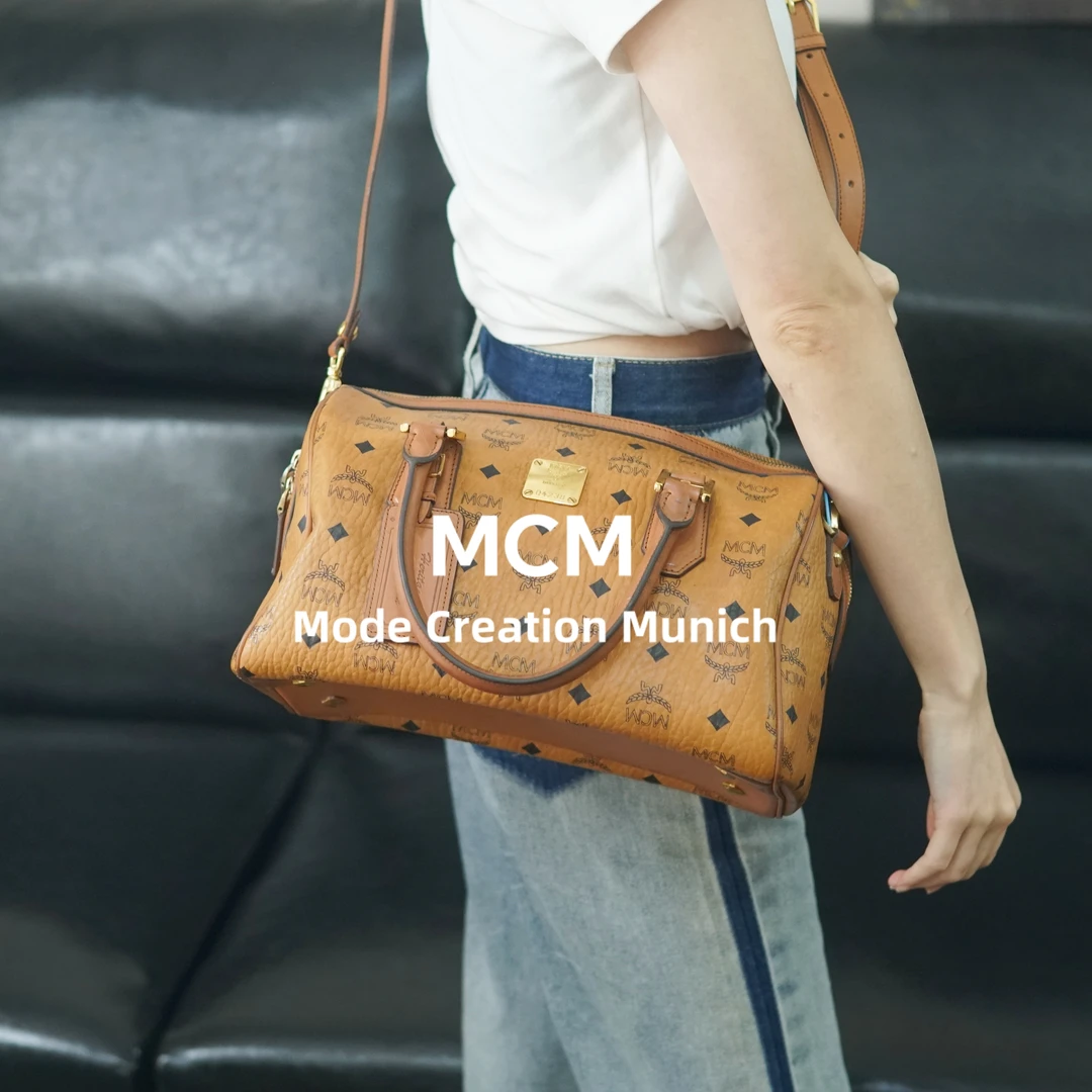 95新 MCM 干邑色枕头包/RD10619015/9015
