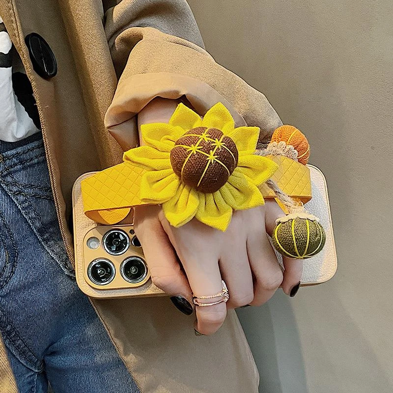 秋冬向日葵南瓜腕带适用iphone苹果15pro新款小众14/13手机壳防摔