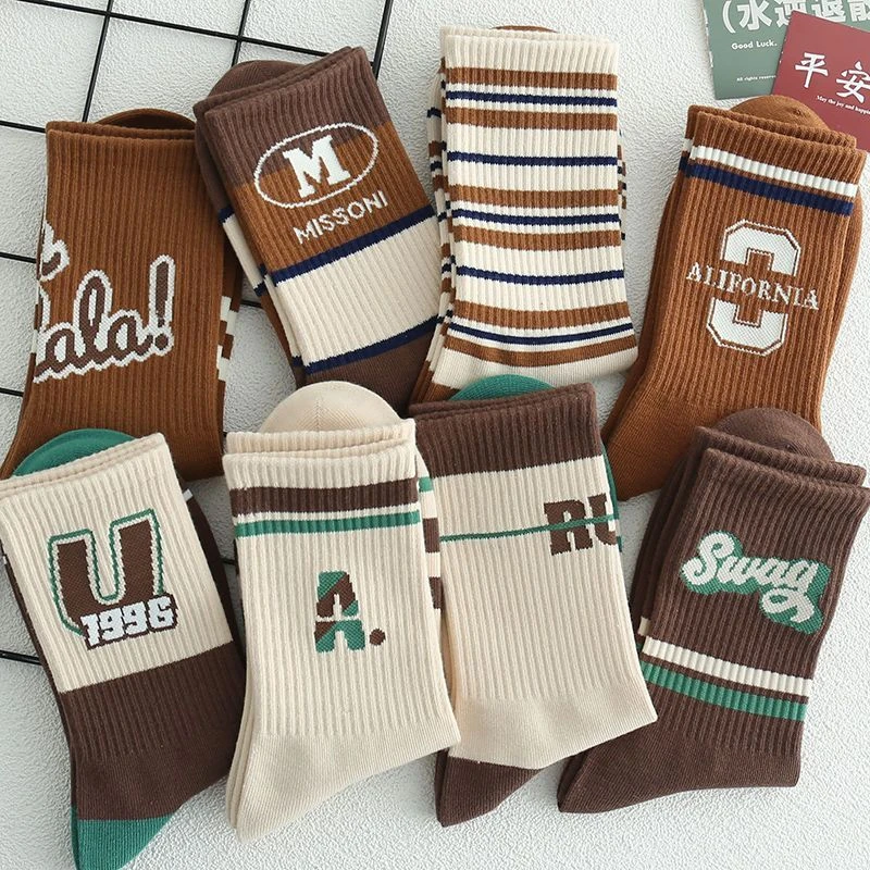 袜子纯棉女士中筒秋冬季ins潮流百搭外穿学生咖色运动字母长筒袜