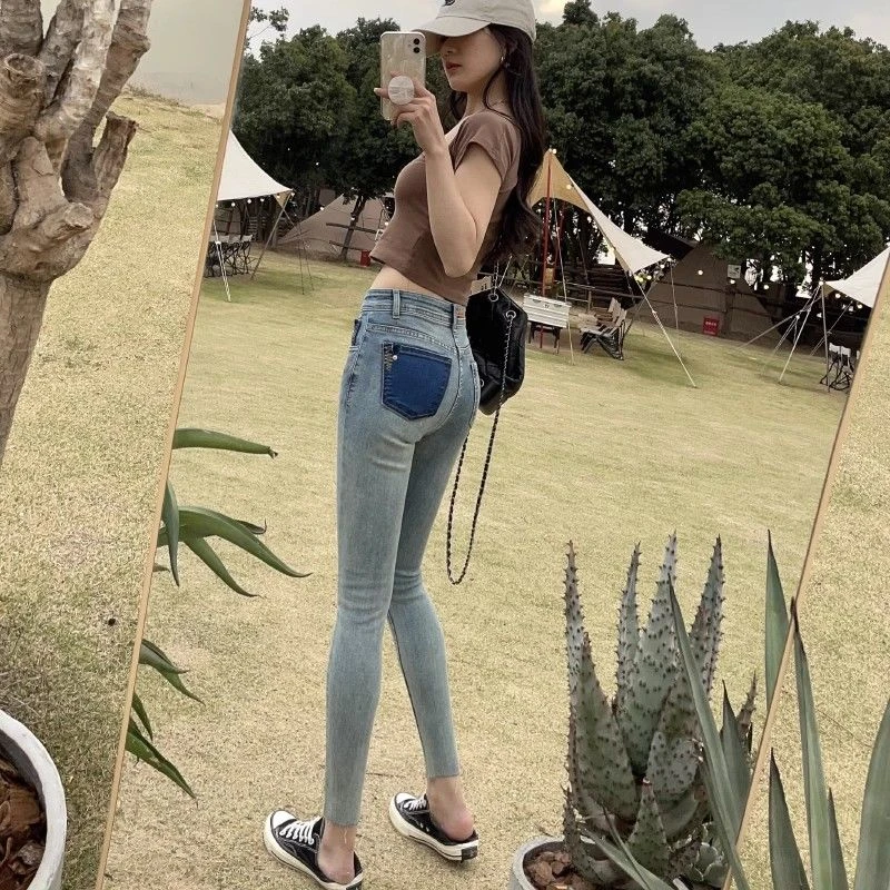 后背细腰提臀紧身牛仔裤复古做旧浅蓝小脚女窄脚裤秋季新款中腰设