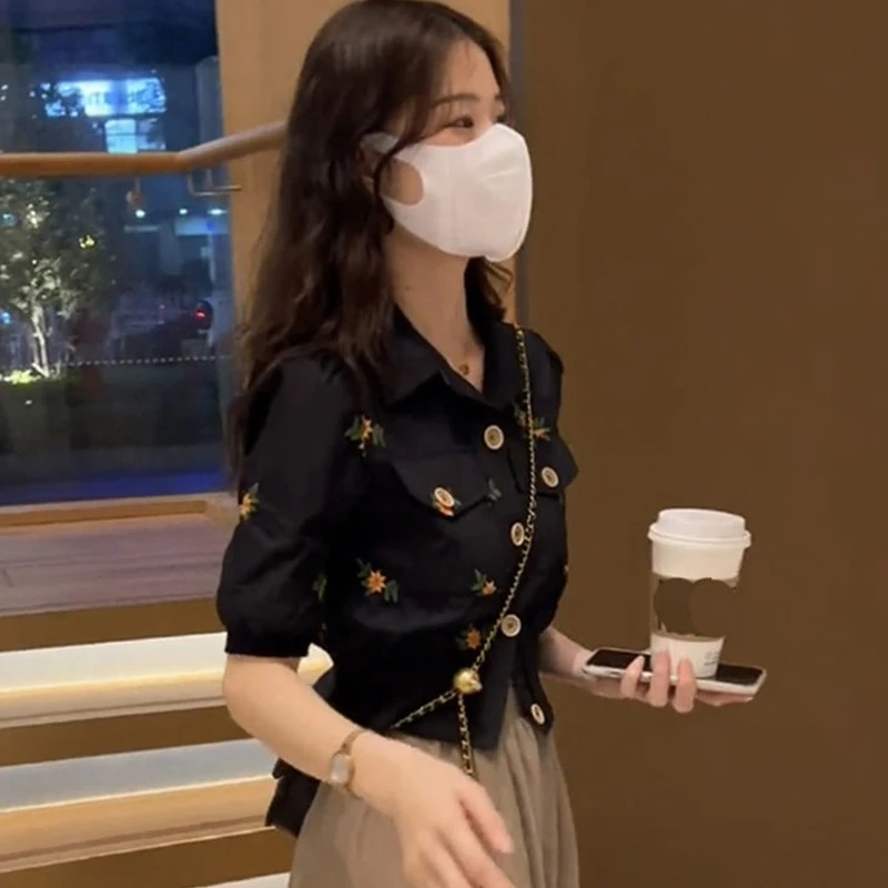 法式时尚单排扣泡泡短袖衬衫女洋气夏季新款修身收腰显瘦短袖上衣