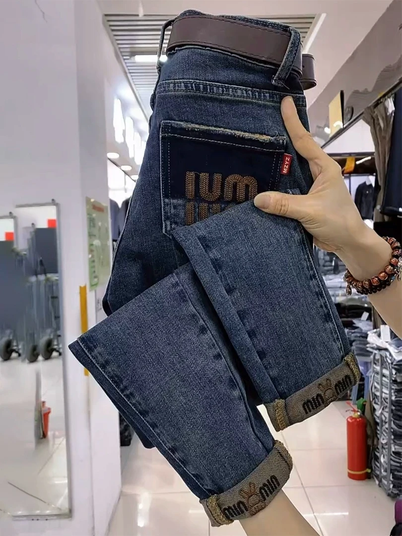 2024秋季新款大码显瘦哈伦牛仔裤女梨形身材胖mm高腰窄版老爹裤子