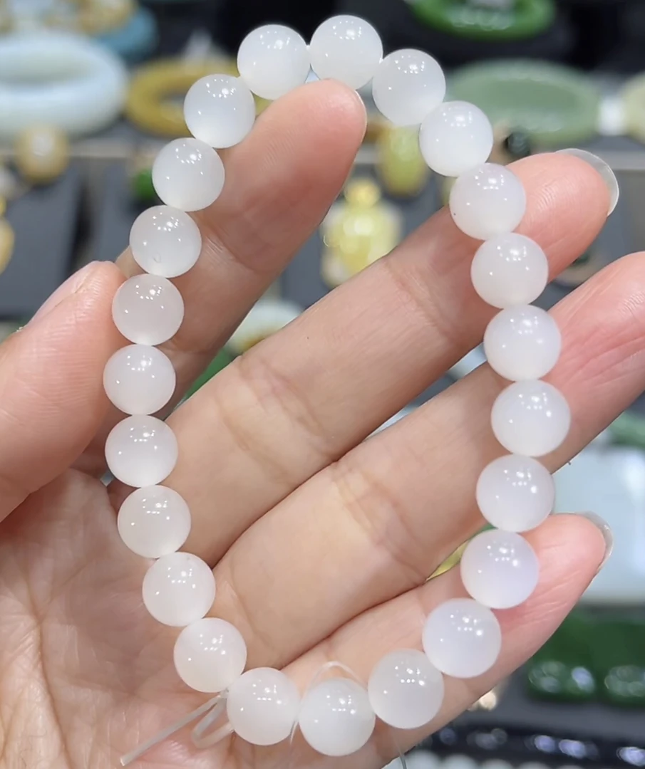 收藏级!野牛沟高冰羊脂白玉起荧光无结构猫眼手串8mm