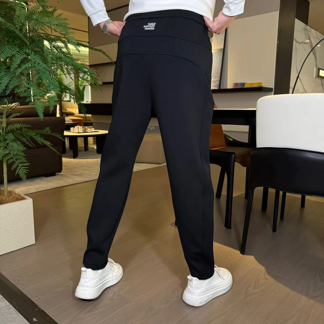 秋冬新款休闲时尚百搭拼接运动刺绣卫裤散直筒裤