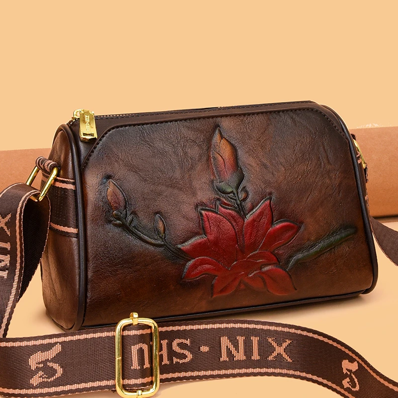 轻奢时尚复古真皮质感包包女2024新款百搭休闲符文雕花单肩斜跨包