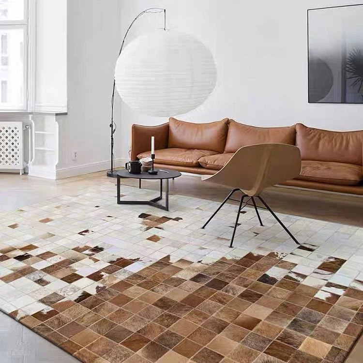 现代轻奢风牛皮皮毛一体地毯高档真皮家用客厅卧室简约欧式拼接