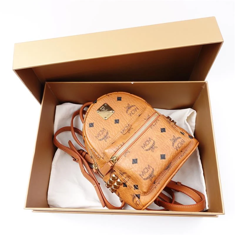 99新 MCM 干邑色铆钉Stark Visetos 超mini双肩包T_ZY0000376222