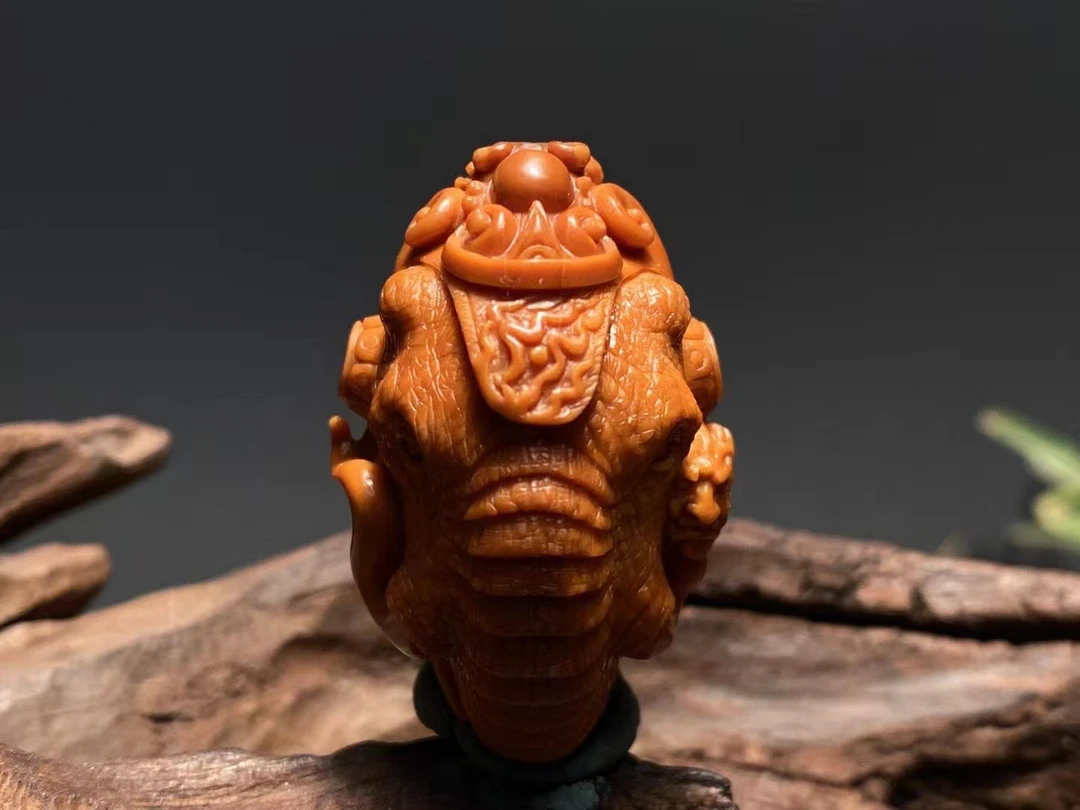 橄榄核纯手工象神三通