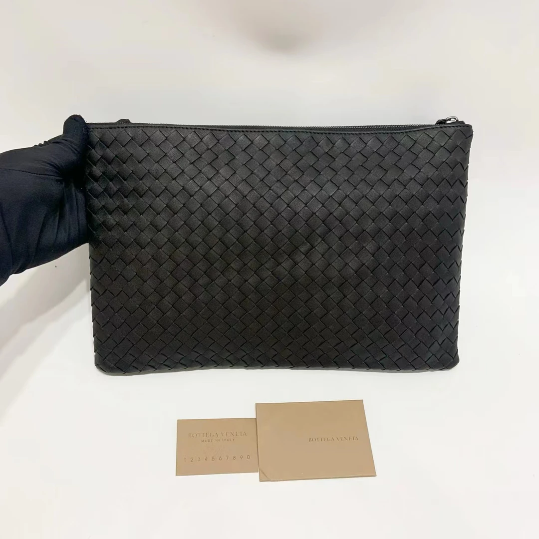 99新 BOTTEGA VENETA/葆蝶家 98新 bv黑色编织休闲手拿包男包