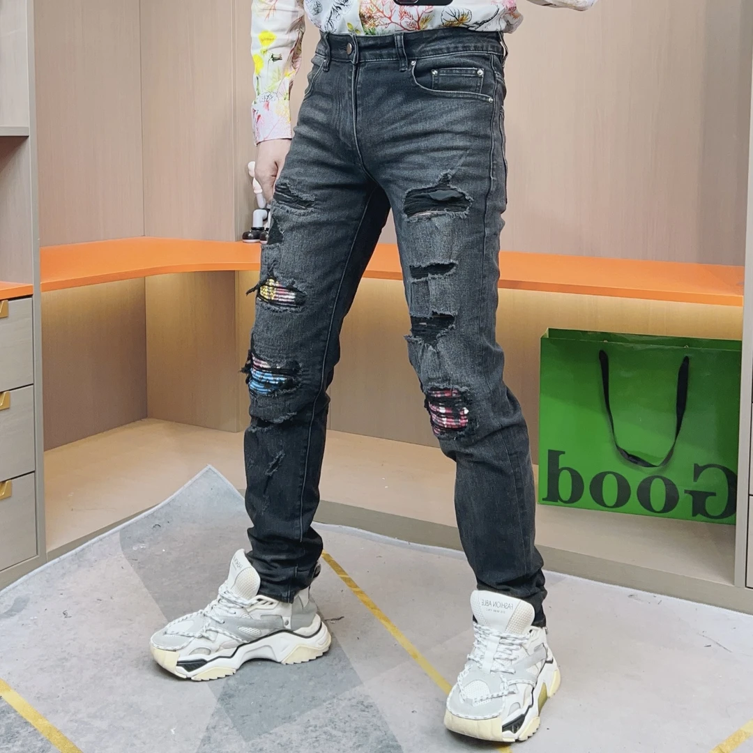 破洞猫须补丁水洗黑色牛仔裤男秋冬新款男士修身帅气拼色小脚裤潮