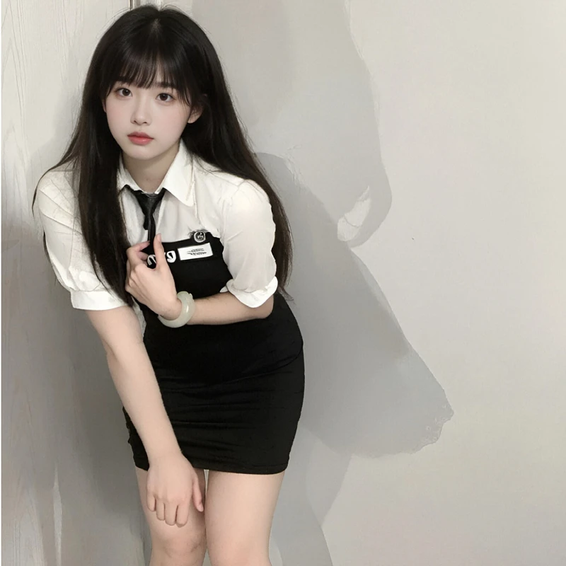 学院风甜酷辣妹假两件镂空露腰JK衬衫连衣裙女夏季性感黑色包臀裙