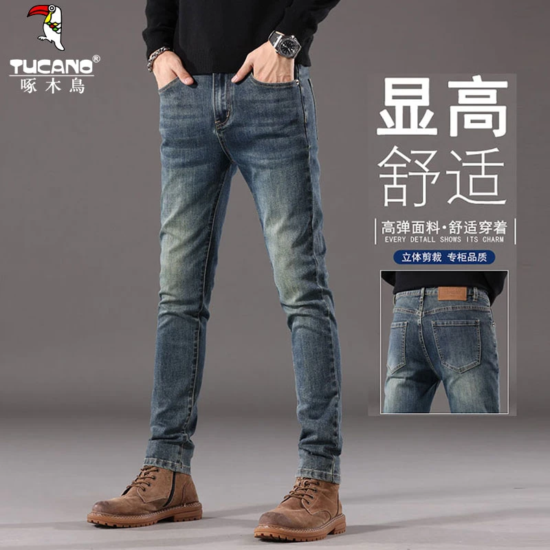 啄木鸟2025秋冬新款牛仔裤男士弹力休闲复古修身小脚弹力长裤子男