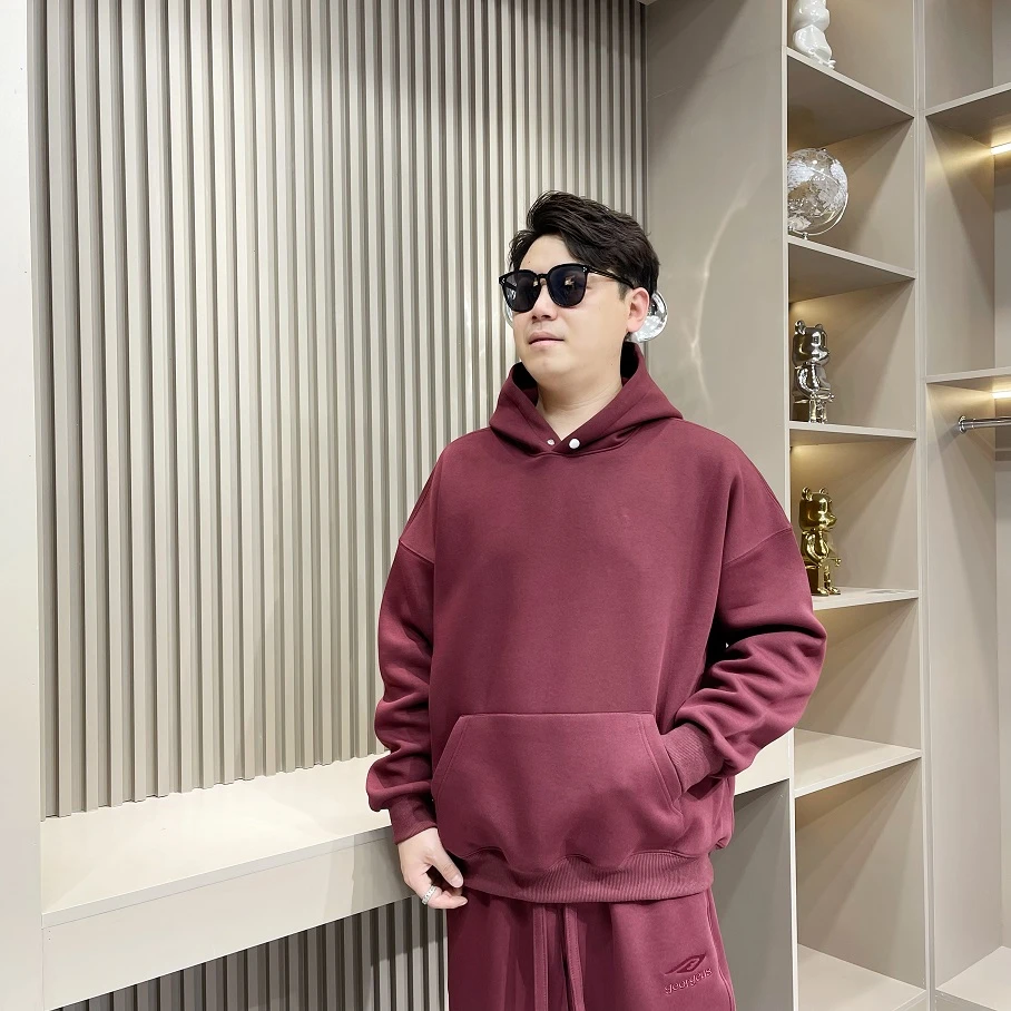 秋冬新款宽松纯色休闲加绒连帽卫衣秋季套头加厚百搭时尚上衣潮流