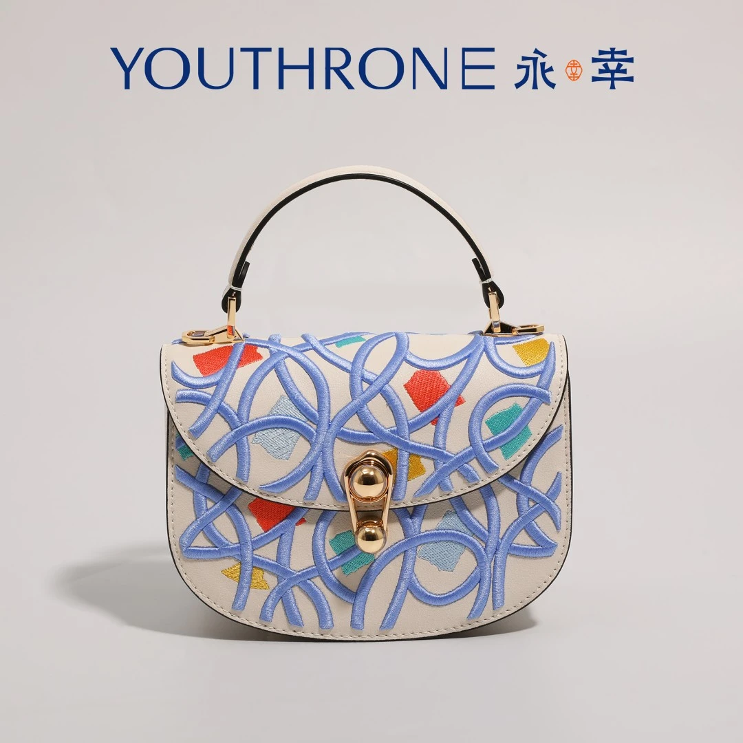 永幸原创夏季百搭时尚女士手提包新款牛皮白蓝拼色便携单肩斜挎包