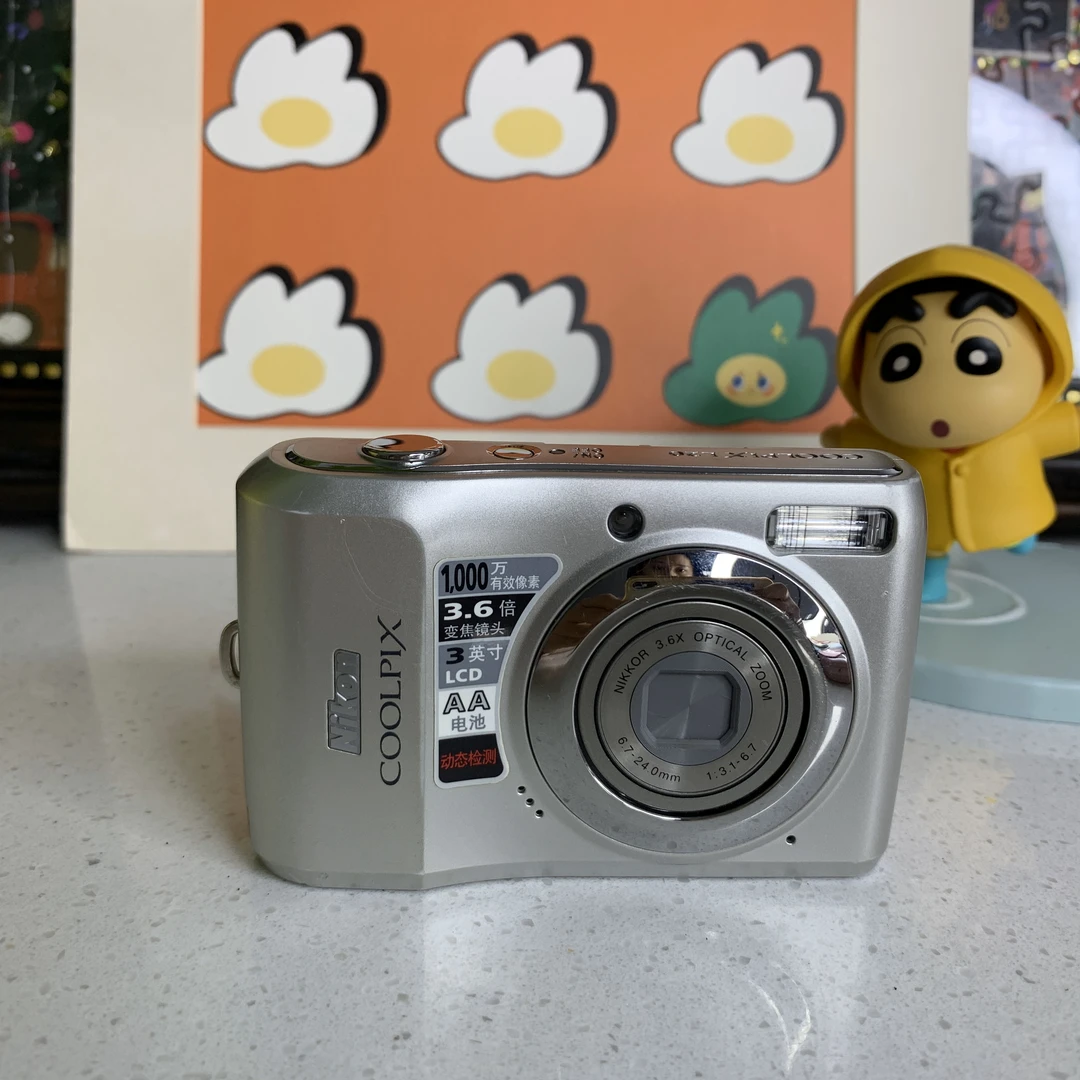 9新 Nikon/尼康 L20银色五号电池自备1000万像素3.6倍 光感亮白