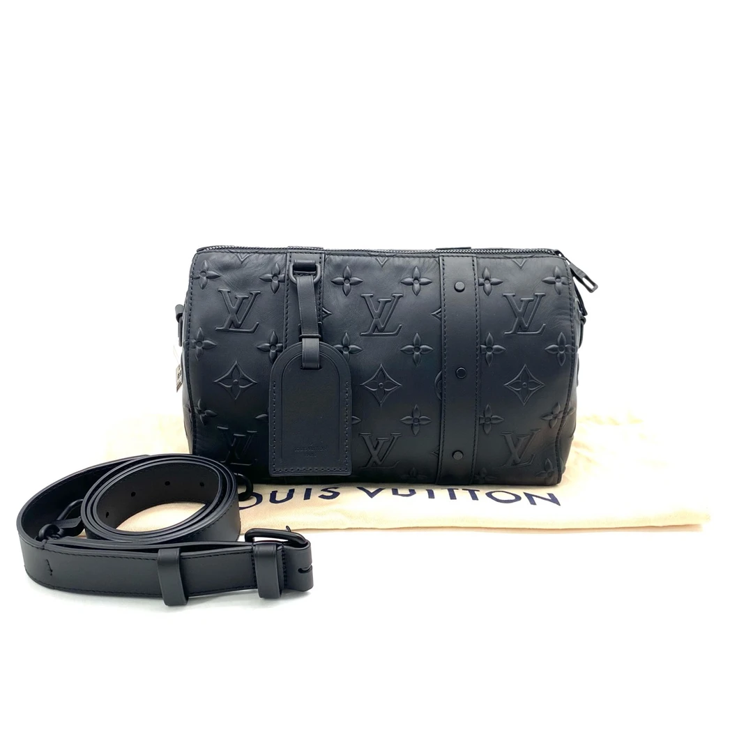99新 LouisVuitton/路易威登 黑色浮雕city keepall 斜挎包 27/17