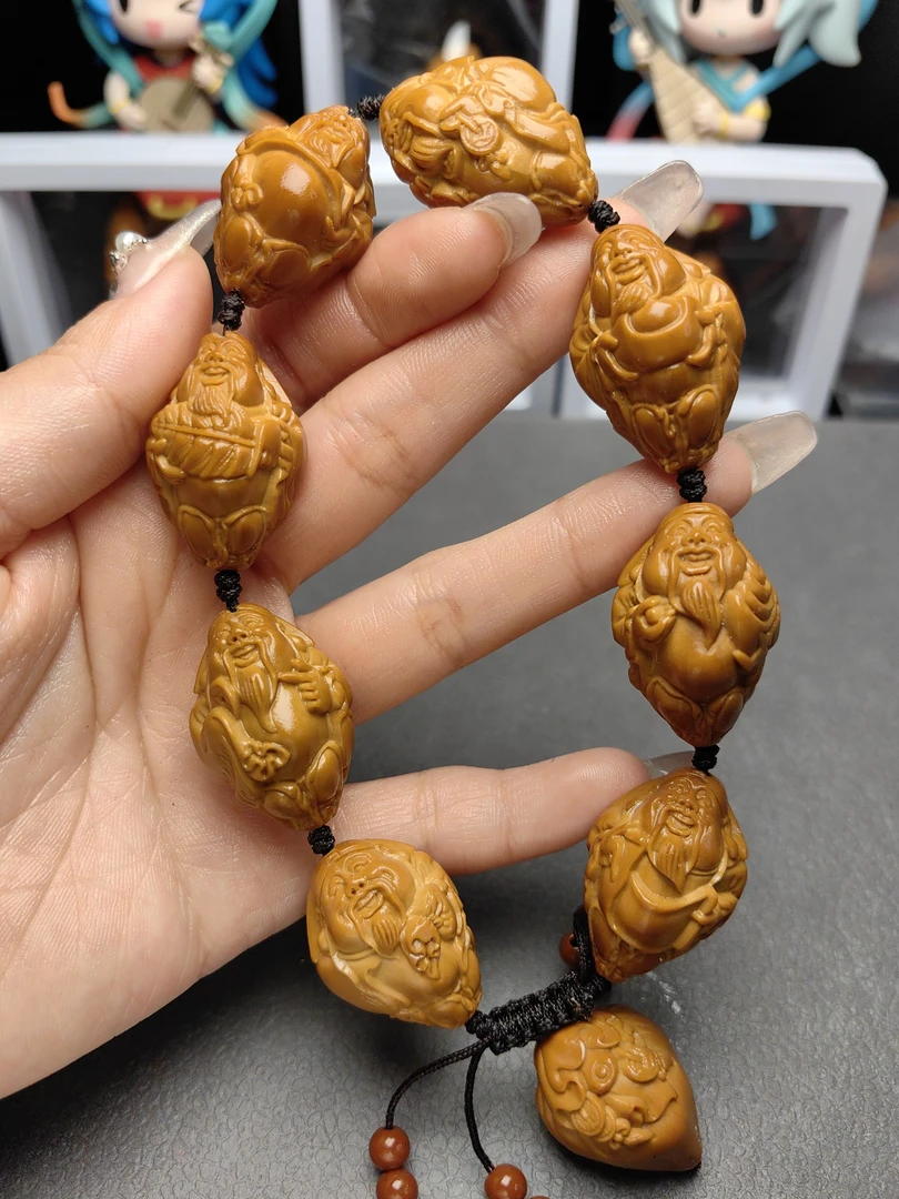 橄榄核雕  八大财神