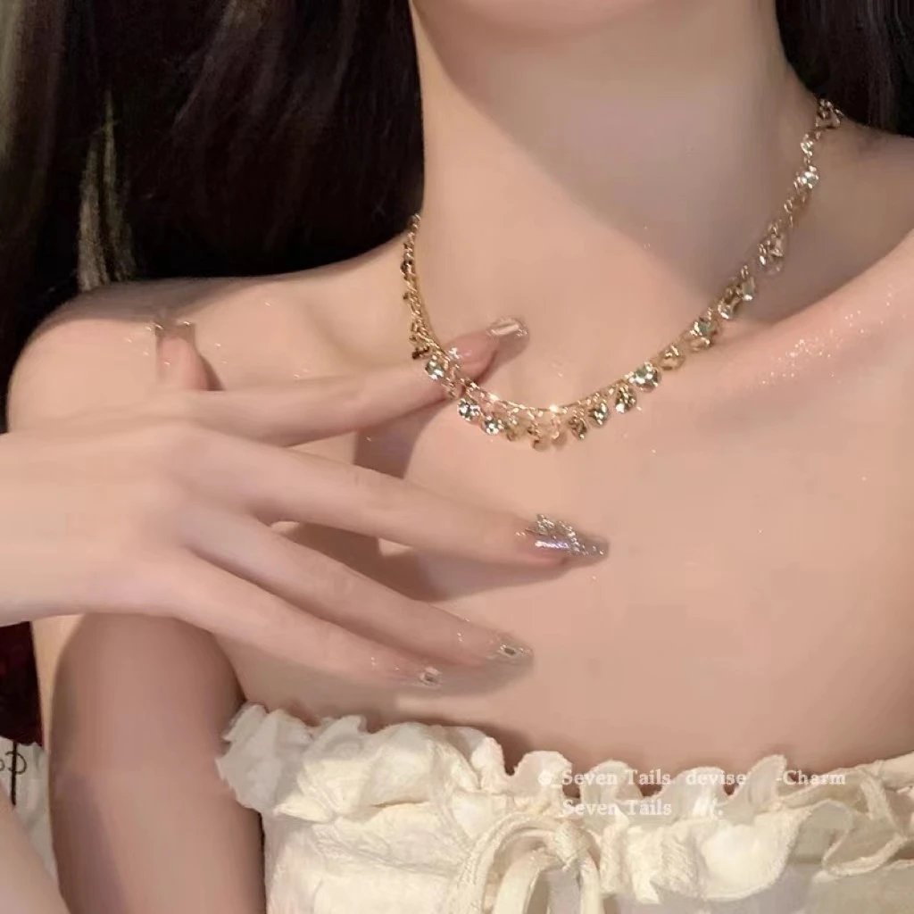铜合金项链 超仙亮片流苏金色叶片法式轻奢灵动小众项链