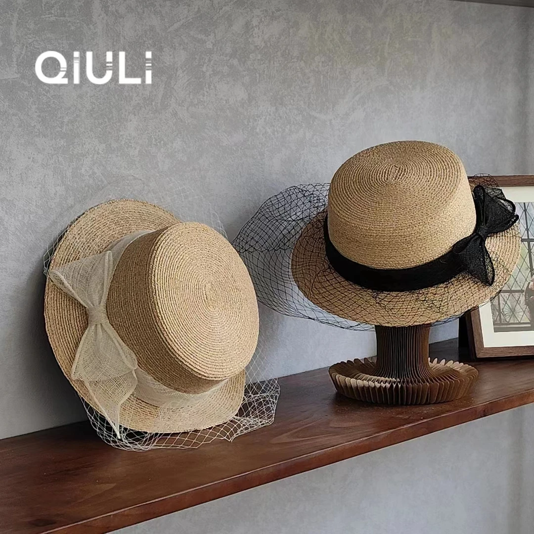 QIU LI · 【拉菲草】赫本风优雅网纱蝴蝶结平顶帽 1d1780