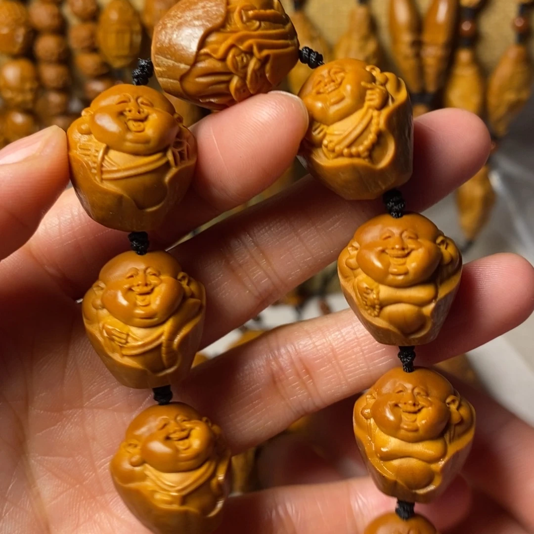 橄榄核核雕包衣弥勒1.9