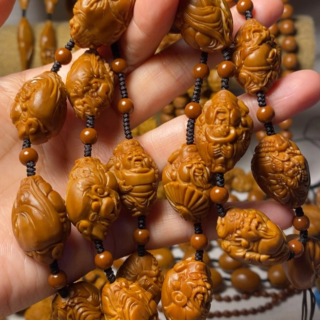 橄榄核核雕一**气财神脖挂