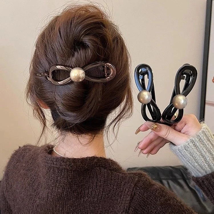 蝴蝶结珍珠一字抓夹女高级感2024新款扭扭发夹后脑勺盘发夹子头饰