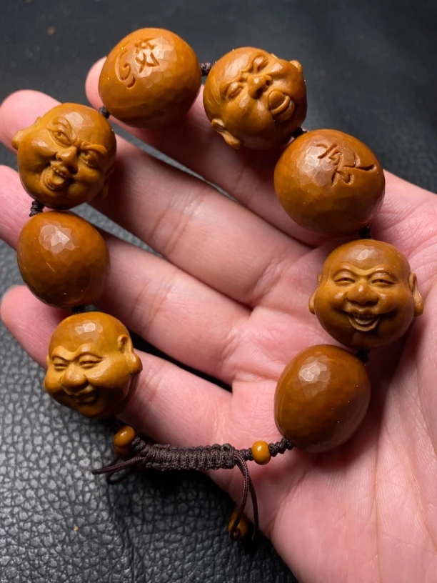 橄榄核雕喜怒哀乐橄榄核雕