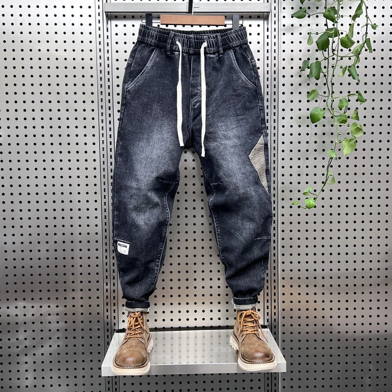 秋冬新款弹力牛仔裤男潮流拼接小脚休闲哈伦裤青年痞帅国潮老爹裤