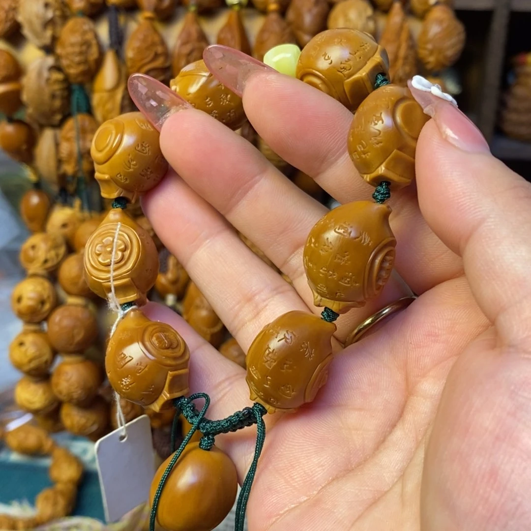 橄榄核核雕铁核把把壶