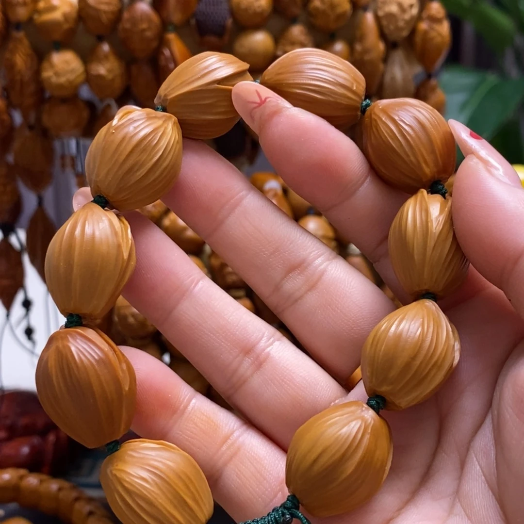 橄榄核核雕开心果