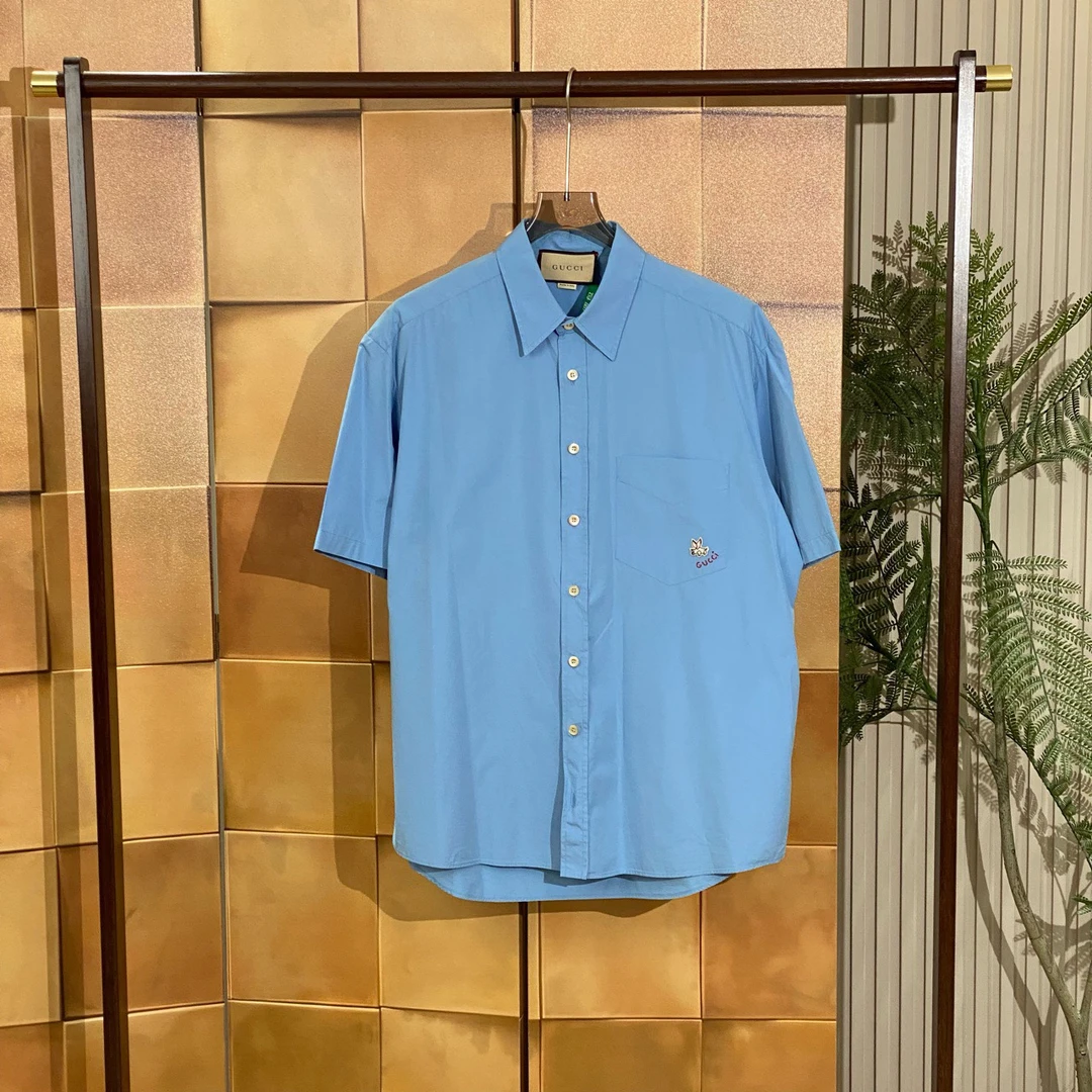 Gucci 23ss新款蓝色刺绣飞猪字母logo短袖衬衫/48码/99新/女42779