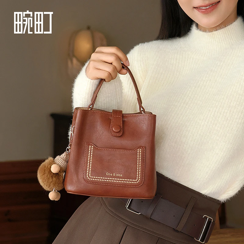 【下架】畹町×oneIdea  2024新款复古都市-水桶斜挎包百搭时尚