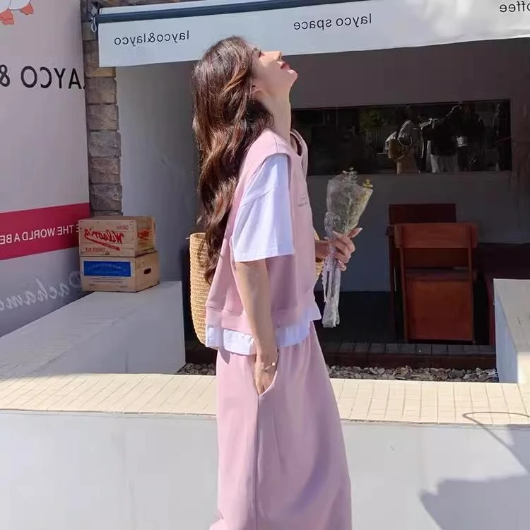 粉色休闲运动套装裙女夏2024新款韩系宽松假两件t恤半身裙两件套