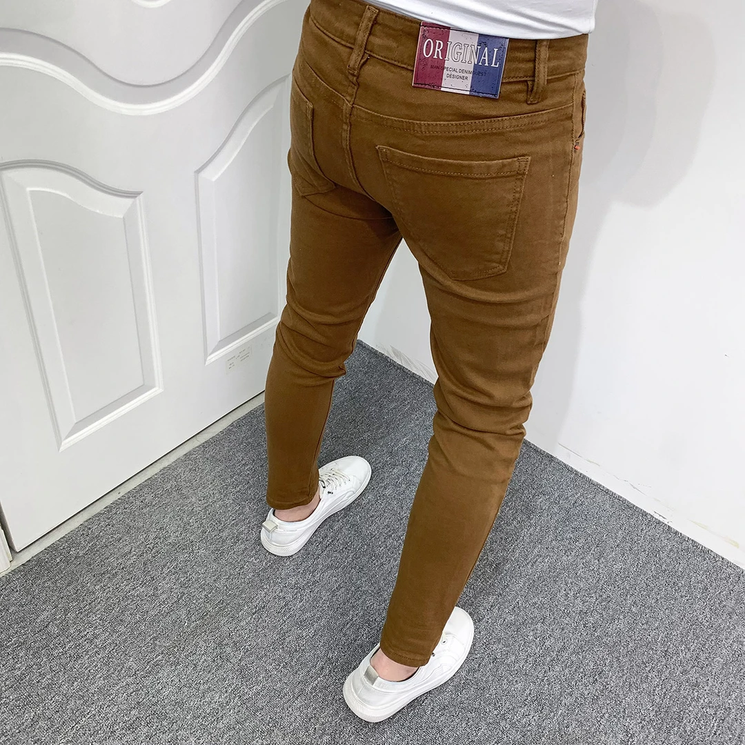 男士潮流纯色九分牛仔裤子韩版新款百搭修身小脚休闲弹力显瘦长裤