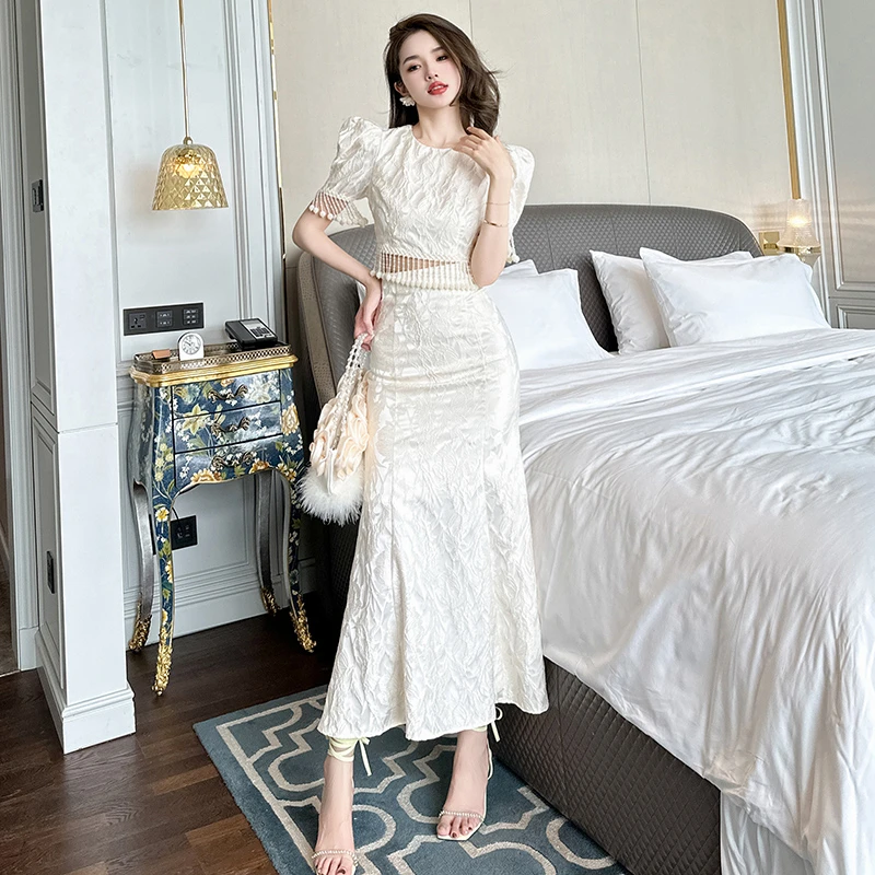 10521 显瘦夏季镂空法式小众气质白色时尚复古性感优雅流苏套装裙