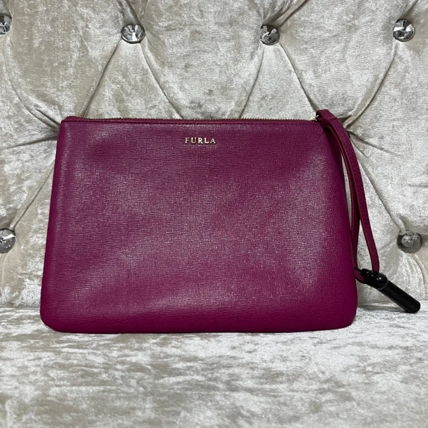 95新 FURLA/芙拉 芙拉 大海粉色手拿包/01060