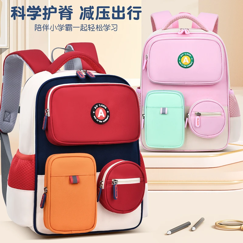 新款小学生书包英伦风儿童双肩包1-3-6年级减负护脊简约防水韩版2