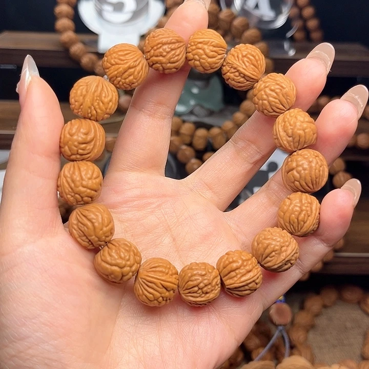 桃核吊坠执***天秦岭龙纹荔枝纹